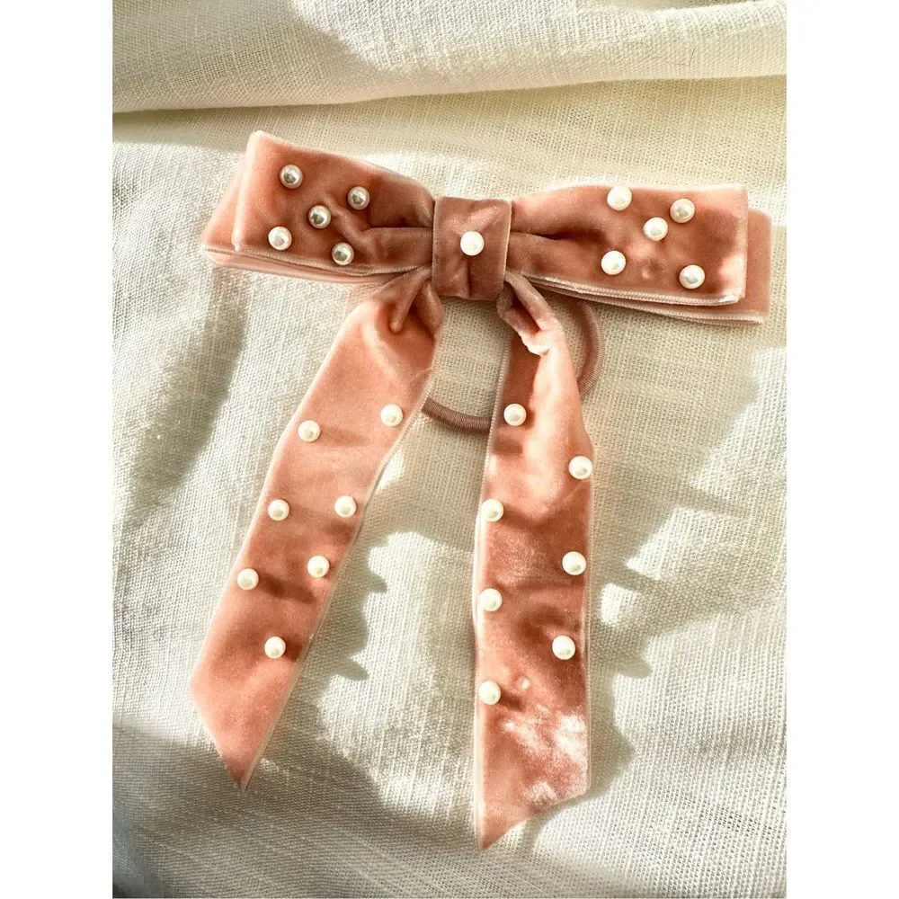 Light pink velvet bow hair tie with pearl embellishment